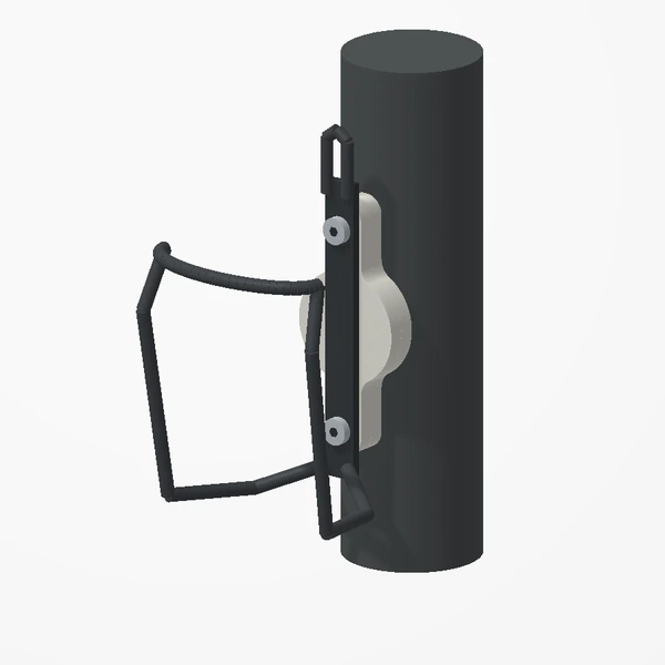The tracker holder installed beneath a bottle cage on a bicycle frame