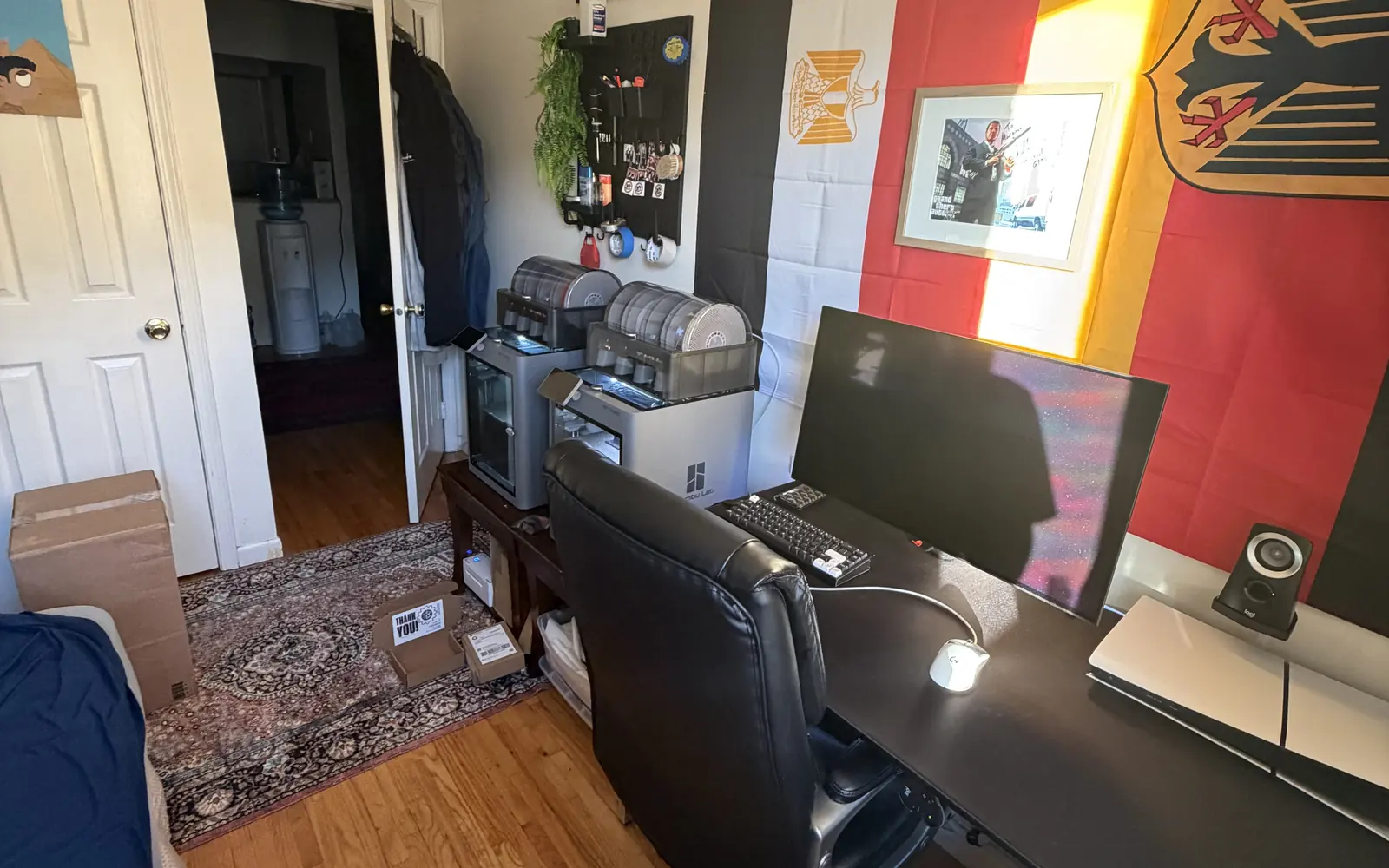 3D printers beside the desk in the Bankasi workspace