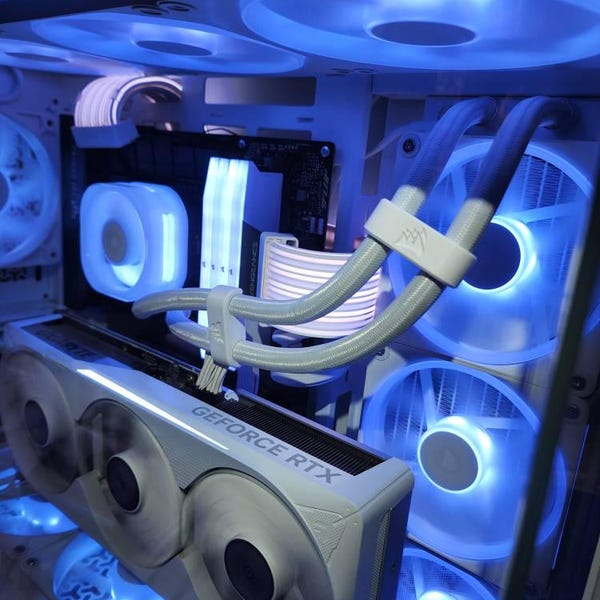Bankasi Creations custom AIO tube keepers installed in customer Jason's white build